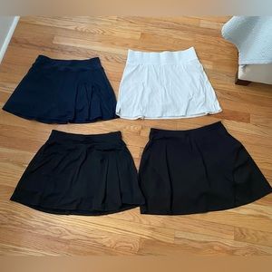 Lot of 4 Golf/Tennis Skirts - All Access, Tommy Hilfiger and More Sizes M and L